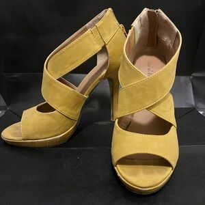 Michael Antonio mustard cross heel